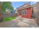 Backyard with a wooden fence, patio, and grass at 1356 N Marion St, Denver, CO 80218