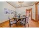 Elegant dining room featuring hardwood floors, chandelier, and comfortable seating for intimate gatherings at 1356 N Marion St, Denver, CO 80218