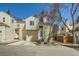 Charming two-story home featuring an attached garage and traditional siding at 12935 W 64Th Dr # D, Arvada, CO 80004