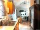Bright kitchen area featuring stainless steel appliances, lots of counter space, and a dining nook at 12935 W 64Th Dr # D, Arvada, CO 80004