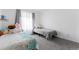 Cozy bedroom featuring two twin beds with a bright window at 4715 E 127Th Dr, Thornton, CO 80241