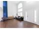 Entryway with dark floors, neutral decor and a seating area at 4715 E 127Th Dr, Thornton, CO 80241