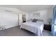 Inviting main bedroom featuring a large window and access to the ensuite bathroom at 4715 E 127Th Dr, Thornton, CO 80241