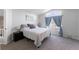 Serene main bedroom with a vaulted ceiling and large window that brings in natural light at 4715 E 127Th Dr, Thornton, CO 80241