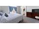 Spacious main bedroom with a large window and ensuite bathroom at 4715 E 127Th Dr, Thornton, CO 80241
