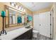 This bathroom offers a gorgeous vanity with a vessel sink, and neutral walls at 8653 E Dry Creek Rd # 1121, Englewood, CO 80112