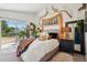 Charming bedroom featuring cozy decor and an abundance of natural light at 8653 E Dry Creek Rd # 1121, Englewood, CO 80112