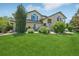 This is a beautiful home with great landscaping and a well-manicured lawn at 8653 E Dry Creek Rd # 1121, Englewood, CO 80112