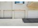 Attached garage parking with private garage door at 8653 E Dry Creek Rd # 1121, Englewood, CO 80112