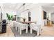 Dining room with a modern table and chairs under a sleek light fixture at 303 Rogers Ct, Castle Rock, CO 80104
