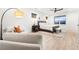 Relaxing main bedroom with stylish decor and a comfortable seating area near bright windows at 303 Rogers Ct, Castle Rock, CO 80104