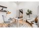 Stylishly decorated home office with comfortable seating and modern lighting at 303 Rogers Ct, Castle Rock, CO 80104