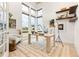 Bright home office with large windows, stylish decor, and modern furnishings at 303 Rogers Ct, Castle Rock, CO 80104