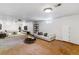 Finished basement with carpet, and entertainment area at 6769 S Foresthill St, Littleton, CO 80120