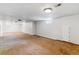 Spacious basement with carpet and white painted walls and ceilings at 6769 S Foresthill St, Littleton, CO 80120