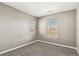 This bedroom features neutral walls and carpeting and has two windows letting in natural light at 1484 Nemrick Pl, Castle Rock, CO 80109
