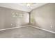 Spacious bedroom with neutral carpet, vaulted ceiling, and ample light at 1484 Nemrick Pl, Castle Rock, CO 80109