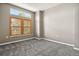 Neutral bedroom with carpet, modern windows, and ample natural light at 1484 Nemrick Pl, Castle Rock, CO 80109