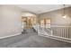 Loft area with stairs and a window view at 1484 Nemrick Pl, Castle Rock, CO 80109