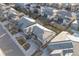 Aerial view of home showcasing its tile roof, backyard, and surrounding neighborhood at 11303 Tango Ln, Parker, CO 80134