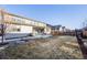 Spacious backyard featuring a concrete patio and outdoor seating at 11303 Tango Ln, Parker, CO 80134