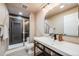 Modern bathroom with glass shower, large vanity, and stylish design at 11303 Tango Ln, Parker, CO 80134