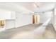 Spacious basement featuring white walls, neutral carpet and recessed lights at 1457 S Franklin St, Denver, CO 80210