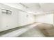Spacious basement with neutral carpet, white walls and small windows at 1457 S Franklin St, Denver, CO 80210
