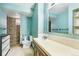 Full bathroom features a shower, toilet, sink, mirror, and custom fixtures at 1457 S Franklin St, Denver, CO 80210