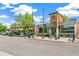 Street view showcasing a commercial area with a restaurant, retail stores, street parking, and pedestrian access at 1457 S Franklin St, Denver, CO 80210