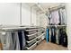 Organized closet with shelving, drawers, and hanging racks for optimal storage at 7602 S Yakima Ct, Aurora, CO 80016
