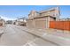 Attached two car garage with concrete driveway and street view in residential neighborhood at 7602 S Yakima Ct, Aurora, CO 80016