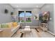 Cozy living room with comfortable seating, stylish decor, and natural light at 7602 S Yakima Ct, Aurora, CO 80016