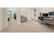 Bedroom area designed for use as a home office space with a printer and desk at 7602 S Yakima Ct, Aurora, CO 80016