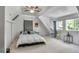 Bright bedroom with ample natural light, neutral carpet and ceiling fan at 4570 Irving St, Denver, CO 80211