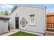 Exterior of the garage highlighting its architecture and a glimpse of the surrounding yard at 4570 Irving St, Denver, CO 80211