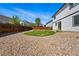 Large backyard featuring gravel and grassy area at 19721 E Vassar Ave, Aurora, CO 80013