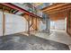 Unfinished basement with exposed beams, mechanicals, and a concrete floor, ready for customization at 19721 E Vassar Ave, Aurora, CO 80013