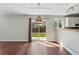 Dining area with sliding glass doors to the backyard, seamlessly blending indoor and outdoor spaces at 19721 E Vassar Ave, Aurora, CO 80013