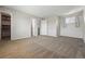 Spacious main bedroom with neutral colors, plush carpet, and a walk-in closet at 19721 E Vassar Ave, Aurora, CO 80013