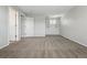 Neutral main bedroom with carpet and natural light from a window, creating a bright space at 19721 E Vassar Ave, Aurora, CO 80013