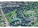 Aerial view of 6 Wilder Lane and the Columbine Country Club in a beautiful neighborhood at 6 Wilder Ln, Littleton, CO 80123