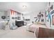 Whimsical bedroom featuring sports-themed décor, pennants, and decorative elements, ideal for a young sports fan at 6 Wilder Ln, Littleton, CO 80123