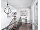 Stylish hallway with modern lighting, beautiful hardwood floors, and elegant decor at 6 Wilder Ln, Littleton, CO 80123
