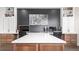 Well-lit home office with custom built-ins, ample counter space, and modern design at 6 Wilder Ln, Littleton, CO 80123