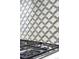 Stylish kitchen backsplash with white quatrefoil pattern and dark grout above a gas range at 6 Wilder Ln, Littleton, CO 80123