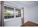 Bedroom with a large window looking out to an exterior view and hardwood floors at 1350 Josephine St # 508, Denver, CO 80206