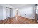Bright bedroom with hardwood floors, large closet, and fresh white paint at 1350 Josephine St # 508, Denver, CO 80206