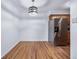Dining room with stainless steel refrigerator, hardwood floors, and modern lighting fixture at 1350 Josephine St # 508, Denver, CO 80206