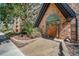 Close up of the Dublin Terrace condo entrance with brick facade and charming details at 1350 Josephine St # 508, Denver, CO 80206